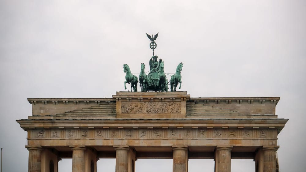 The historic Brandenburg Gate in Berlin, a symbol of Germany's unity and history.
